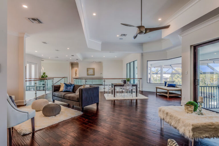 Open concept remodel with high ceilings and modern living area