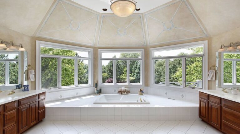 master bath in luxury home with windowed tub area