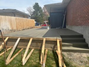Professional concrete contractor backyard porch installer