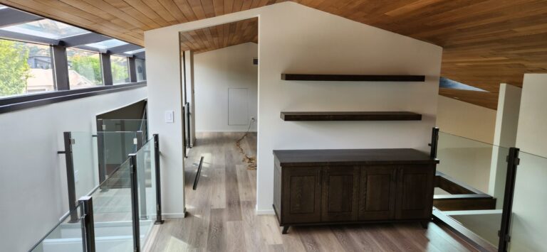 Modern remodel with wood ceiling and built-in storage