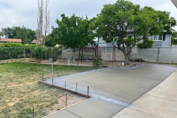 Professional concrete contractor backyard patio installation